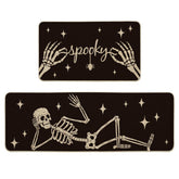 Artoid Mode vue frontale du lot de deux tapis noir motif squelette pour décoration Halloween et protection sol