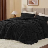 BEDELITE couette vue de face montrant finition noire et couverture moelleuse
