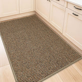 BEQHAUSE vue avant du tapis taupe montrant finition et protection