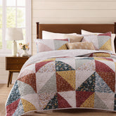BLOOMHAVEN couette face avant montrant motif patchwork et élégance