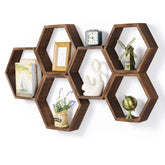 CADUKE étagère hexagonale face montrant design flottant et gain d'espace
