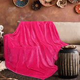 cagulax couverture pliée montrant couleur rose et rangement facile pour gain de place