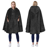 Catalonia poncho face avant montrant coupe oversize et boutons, confort immédiat