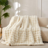 COOVA plaid ivoire posé montrant douceur et style cocooning