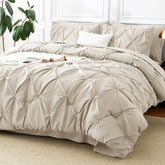 CozyLux vue avant de l’ensemble 7 pièces montrant style pintuck et finition élégante