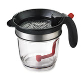 Cuisipro séparateur devant montrant le pichet transparent et la poignée ergonomique pour versement précis