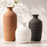 Dobbyby vase ensemble devant montrant trois tailles et polyvalence décorative