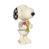 Enesco Jim Shore figurine Snoopy face montrant sourire et bouquet, cadeau charmant