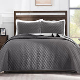 Exclusivo Mezcla face avant montrant couette king grise et taies, design élégant