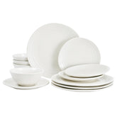 famiware vue frontale du service 12 pièces montrant assiettes et bols, esthétique artisanale
