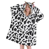 Fiosnow vue avant avec capuche montrant le motif vache et confort chaud