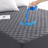 GRT protège-matelas face avant gris montrant finition matelassée et confort