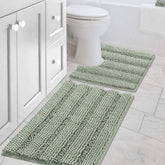 H.VERSAILTEX tapis face avant montrant design rayé et finition élégante