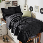 HEVUMYI ensemble face avant montrant couette noire et draps, look moderne et cosy