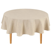Hiasan nappe ronde beige montrant le tombé élégant et la protection de la table