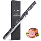 Huusk STRONG face de la lame montrant coupe précise et durabilité