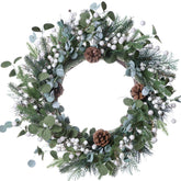 J'FLORU couronne de Noël accrochée à une porte apporte accueil festif