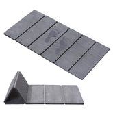 JOYMOOP tapis devant la baignoire montrant finition gris foncé et surface absorbante