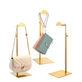 KDYZS+ présentoir face avant doré montrant un sac bien mis en valeur