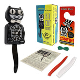 Kit Cat Klock face avant noire dans son coffret, design rétro et charme décoratif