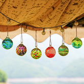 KRISININE boule de verre face avant montrant couleur vive et finition artisanale