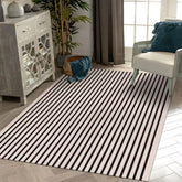 LEEVAN tapis rayé 5x8 vue face montrant motif moderne et protection d'entrée