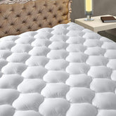 MATBEBY vue de face du surmatelas avec emballage, mise en place facile
