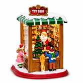 Moments in Time face de la Boutique du Père Noël éclairée pour ambiance chaleureuse
