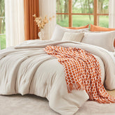 MUXHOMO couette beige face avant montrant l'ensemble complet et confort