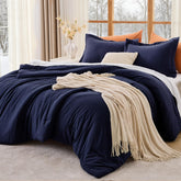 MUXHOMO couette face pleine bleu marine montrant finition et confort