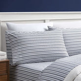 Nautica face du paquet montrant le jeu de draps Twin XL et ses bénéfices pratiques