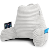 Nestl coussin de face montrant soutien dorsal et bras rembourrés pour confort