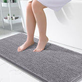 OLANLY vue de face du tapis de bain montrant douceur et design protecteur