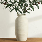 ooit vase face avant montrant silhouette rustique et effet chaleureux