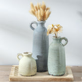 ooit vases ensemble face avant montrant équilibre et style décoratif