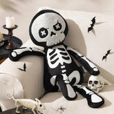 Phantoscope coussin squelette face affichant un look décoratif accueillant