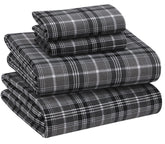 RUVANTI drap housse face montrant ajustement et maintien durable