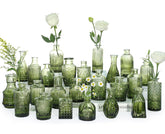SUPMIND vase en verre devant le packaging, protection et élégance visible
