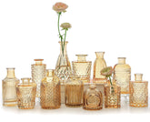 SUPMIND vue de face de 12 vases ambre pour centre de table élégant