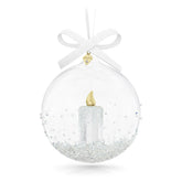Swarovski boule 2023 face avant montrant la flamme dorée et brillant festif