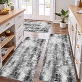 Tritard ensemble de trois tapis montrant design abstrait et harmonisation moderne