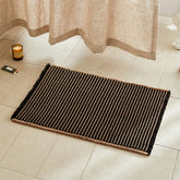 TYUU tapis de bain face avant montrant le motif boho et le confort