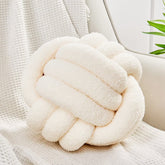 Uvvyui coussin face crème montrant forme ronde et style décoratif