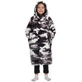 Waitu frontal avec capuche camo montrant coupe oversize et confort