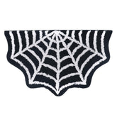 WITTIZA tapis toile d'araignée posé devant lavabo pour effet décoratif