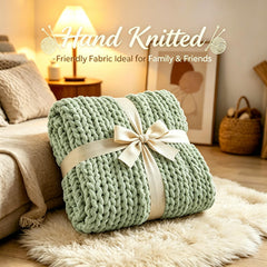 Admitrack plaid drapé sur canapé créant ambiance chaleureuse