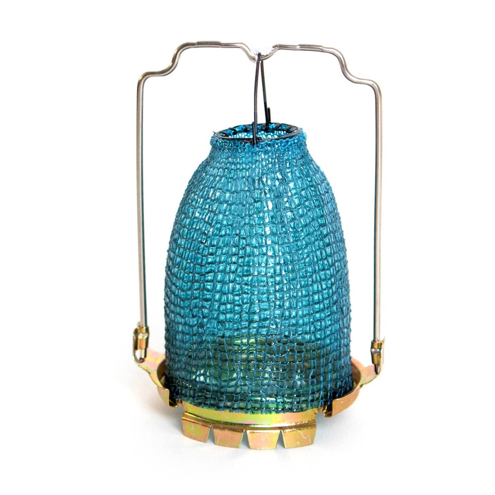 Lampe Aladdin équipée R150 éclairant un coin lecture, offrant une lumière chaleureuse et claire