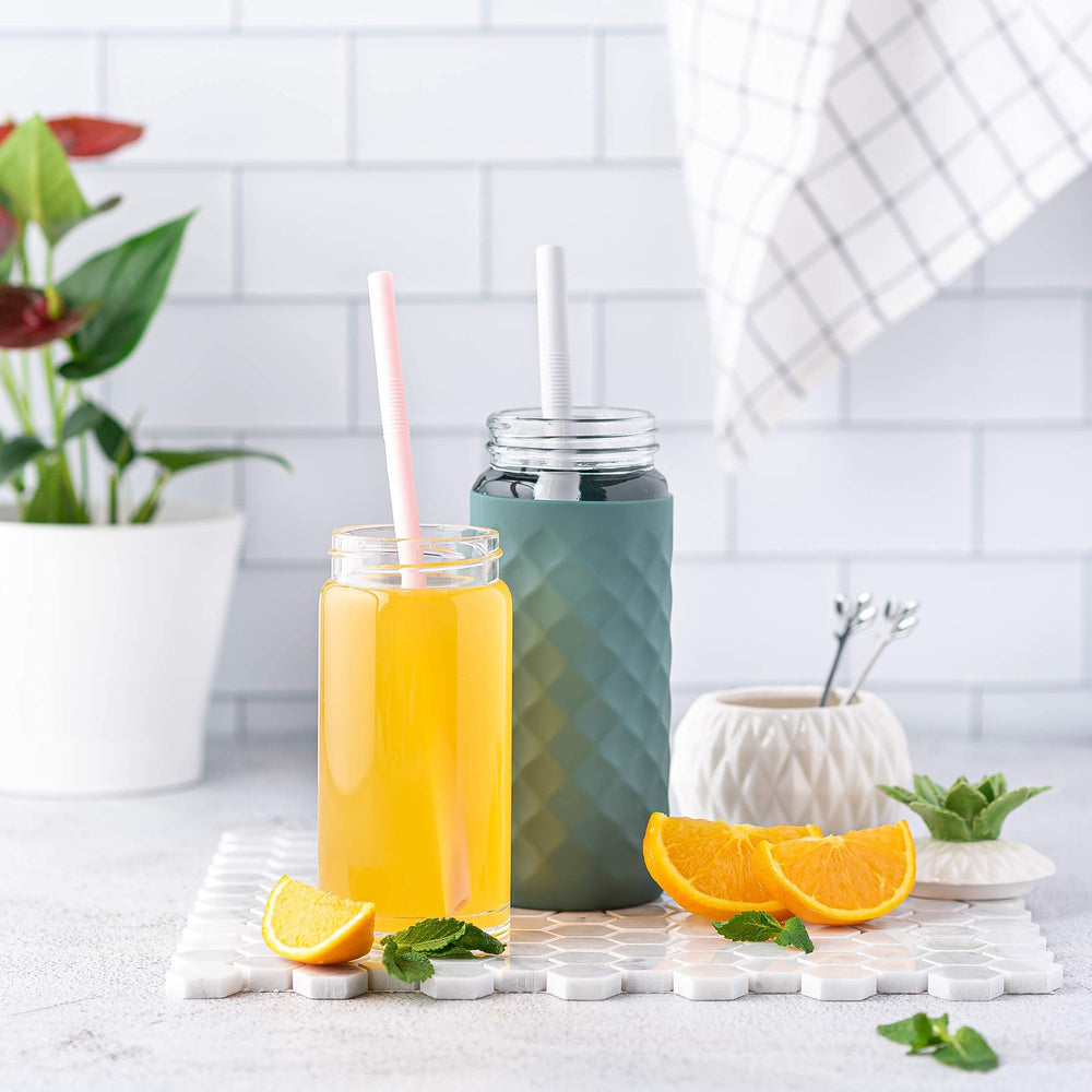 All About Juicing bouteille avec manchette silicone option offrant protection