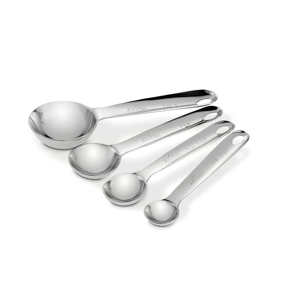 All‑Clad cuillères doseuses face avant montrant finition inox durable