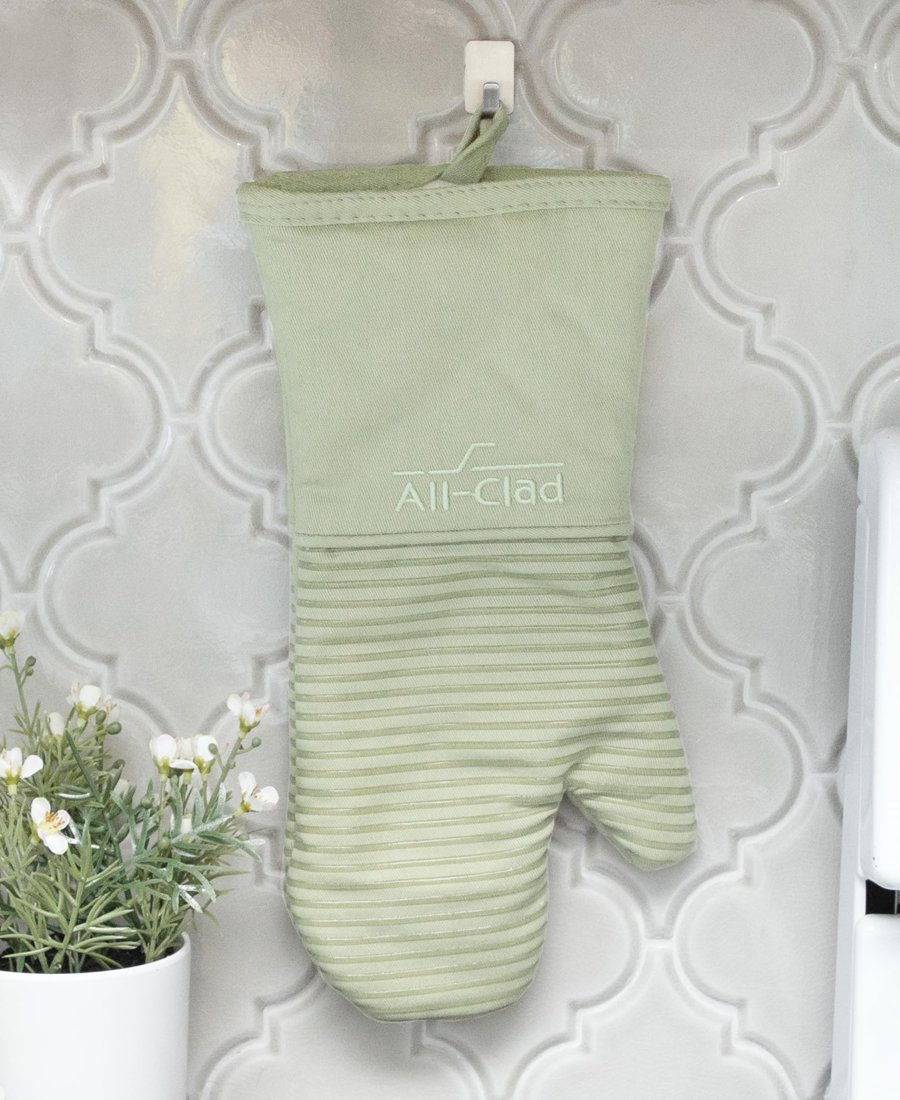 All‑Clad mitaines lors d'un barbecue offrant protection et stabilité